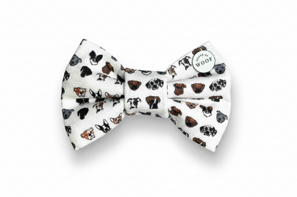 Dog bow tie with printed dog pattern on a white background