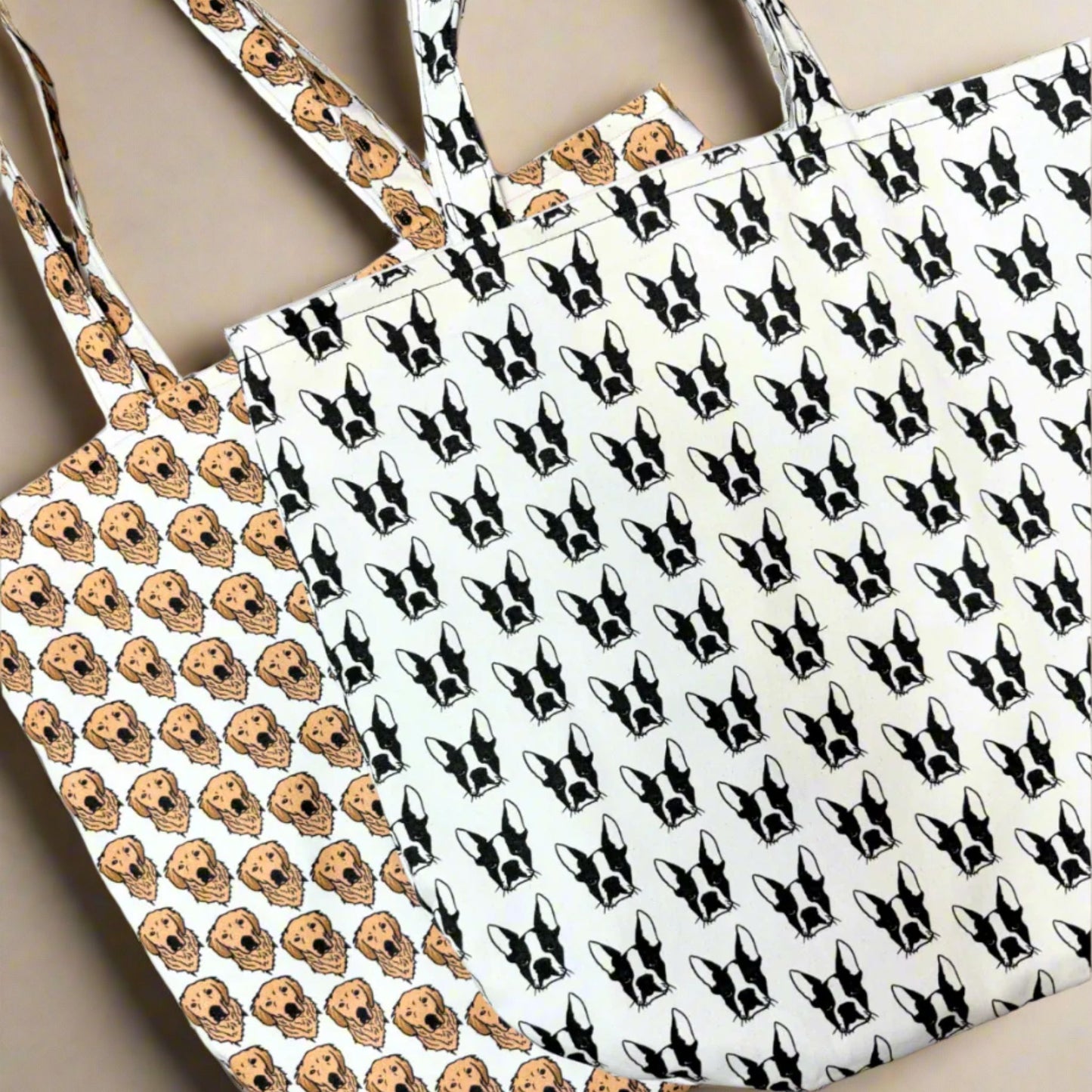 Two eco-friendly tote bags by House of Woof featuring hand-drawn dog breed patterns — Golden Retriever and Boston Terrier designs.