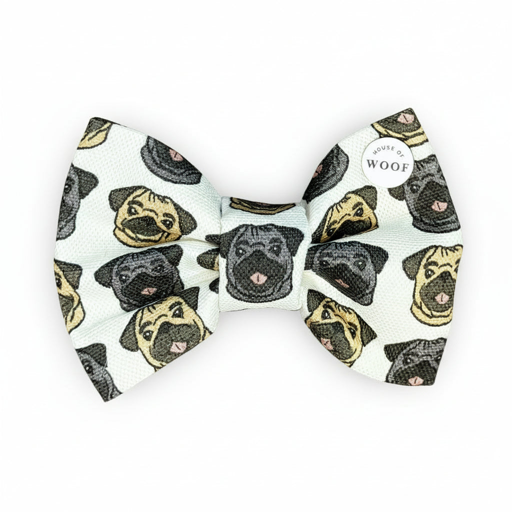 Pug dog bow tie featuring hand-drawn breed artwork in cream and brown tones, handmade by House of Woof.