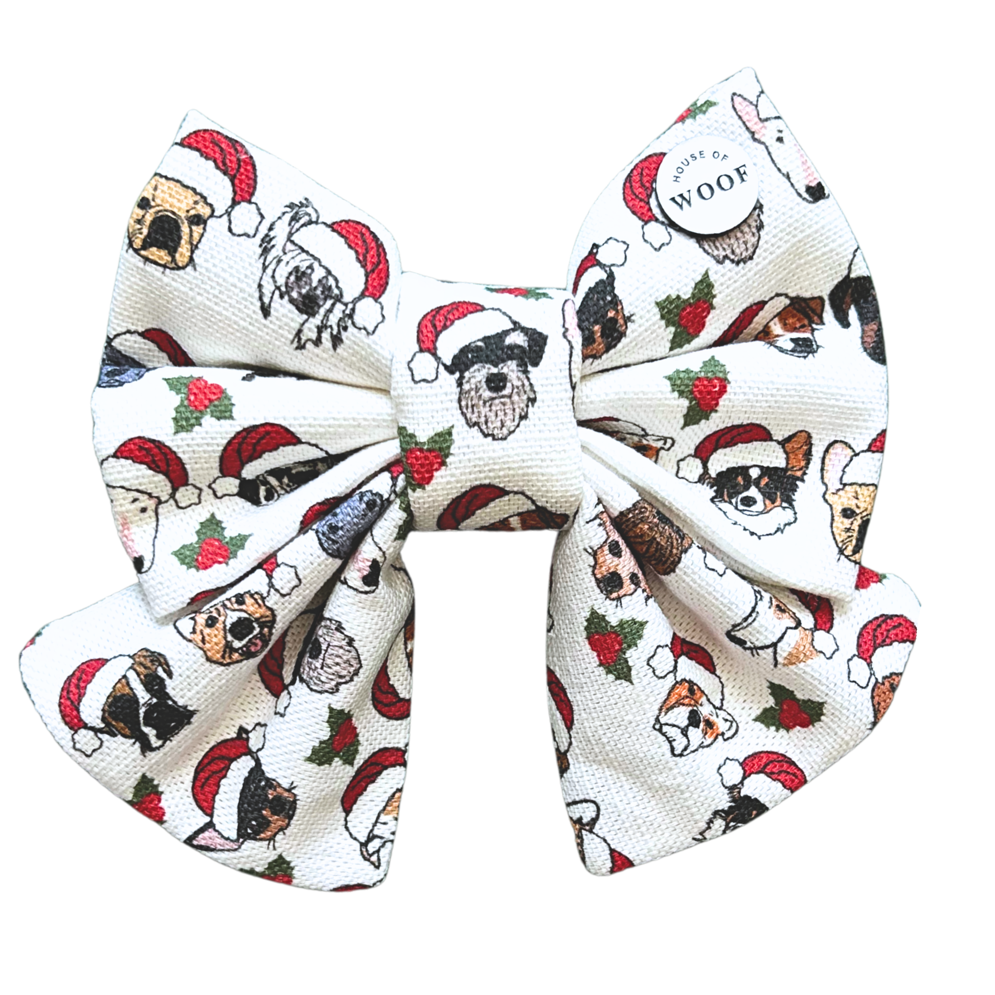 House of Woof Holly Christmas bow with illustrated dog breeds wearing Santa hats surrounded by holly berries and leaves. Festive handmade accessory for dogs and dog lovers
