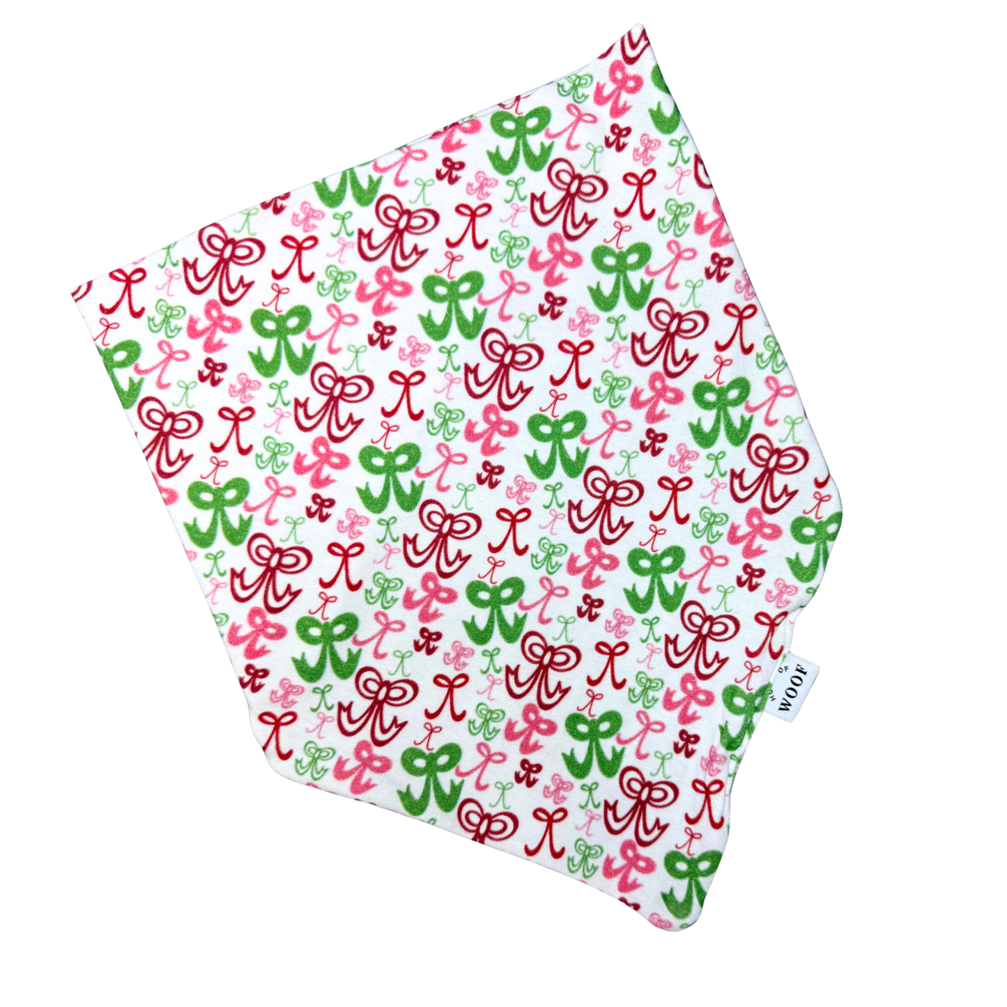 House of Woof Christmas dog bandana featuring a festive red, green, and pink ribbon print on a white background. Handmade holiday accessory for dogs and dog lovers.