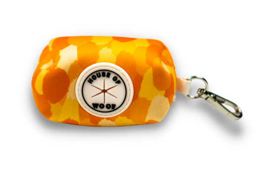 Tangerine coloured dog poop bag holder with silver hardware